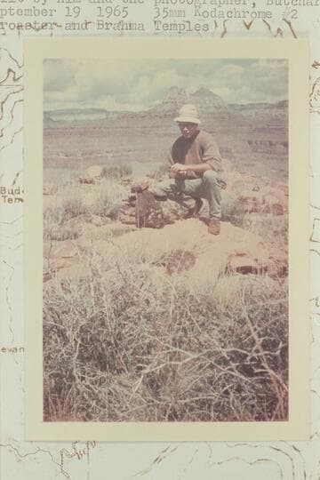 North from top of Pattie Butte showing Jim David at cairn built by him and the photographer, Butchart
