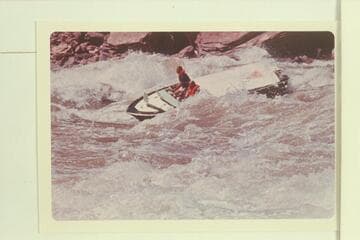 Jim Bechtel drives Triangle through Hance on the right.  Komie is passenger