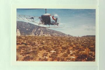 Bill Hall's Bell helicopter above the mesa west of Rainbow Bridge