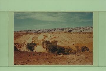 Sand dunes in Hall Creek.  Water Pocket Fold in background