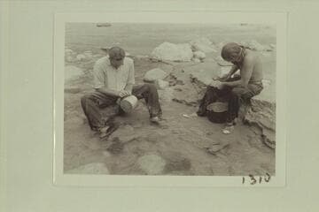 Wayne McConkie and Pres Walker scrub the pots at Diamond Creek
