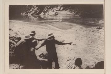 Some obvious posing to demonstrate the checking of a rapid;  Nevills party of 1938