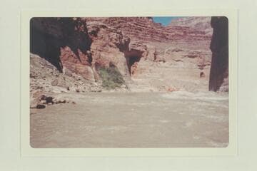 Cruising  up the Vaseys Paradise on the jet run of 1960.  Stanton Cave at right.  Lees Ferry gauge:  11,100 cfs