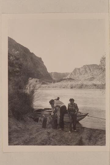 The fueling of the "Esmeralda" at Lees Ferry.  Doris Nevills has made an inspection and is walking away