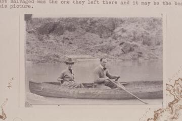 Ellsworth Kolb at the oars of Dave Rust's folding boat at the mouth of Bright Angel Creek.  Marie is trying to remain calm while participating in Ellsworth's first boating experience