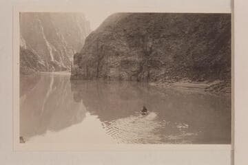 Wrangler and dudes in the eddy above the suspension bridge in the skiff "Bright Angel"