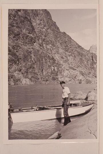 Jim Jordan and his outboard boat near Mile 234 waiting for the Wright-Rigg power cruise