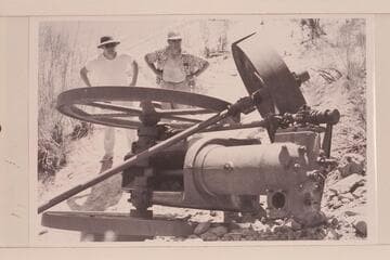 Members of the Jack Frost party at the engine at Spencer's Camp