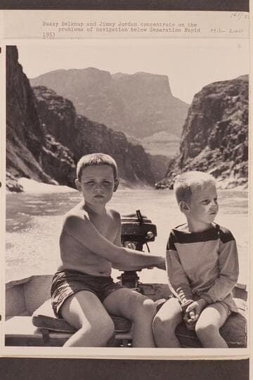 Buzzy Belknap and Jimmy Jordan concentrate on the problems of navigation below Separation Rapid.  Mile 240