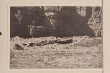 In Marble Canyon.  Galloway-Stone cruise.  The boat is descending stern-first according to Galloway's plan.  Dubendorff at the oars.  Mr. Stone describes this as "a few brief moments of glorious life."