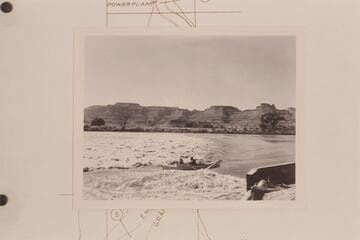 Moulty Fulmer drives the "Moja" through the race at the left side of the dam above Green River.  Maradel Marston rides with him