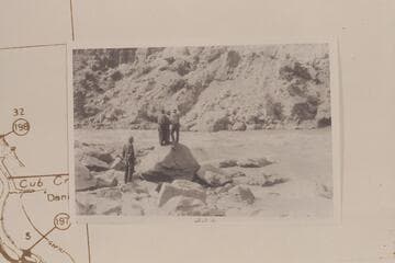 Galloway at right pointing to course through rapid in Split Mountain at Mile 204.5.  Their count was #7