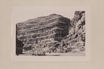 Looking upstream at small side canyon; left bank; Mile 82.9.  In rapid 1/2 mile above Johns Canyon