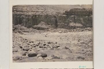 Boat in lower end of riffle at Mile 72.2