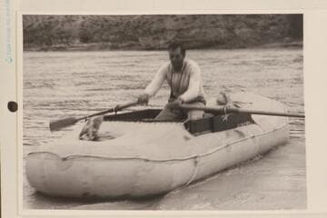 Amos Burg in "Charlie" as it is raining; Green River, Wyoming