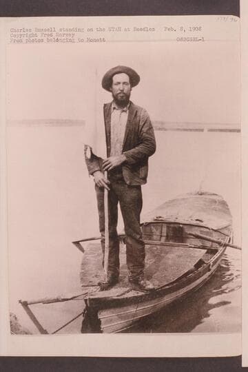 Charles Russell standing on the "Utah" at Needles