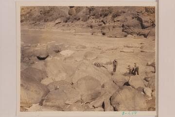 The Dusty Dozen lining and portaging Vulcan Rapid