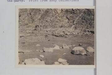 Skiff of the Dusty Dozen takes a wave shown at center of print in Pipe Creek Rapid