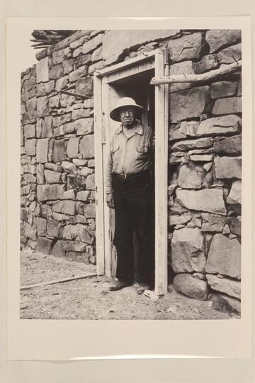 Robert Glass Cleland.  Doorway of the fort at Lees Ferry.  At end of San Juan and lower Glen Canyon traverse