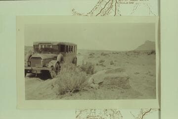 Bus on road between Cameron and the Navajo Bridge at time of the dedication of the Bridge.  Print from Freeman collection