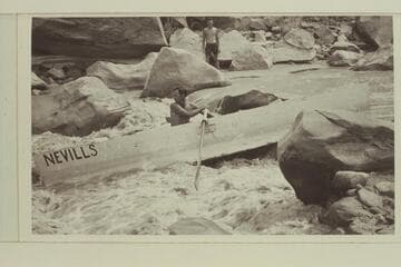 Kent Frost watches Norm Nevills in his early rock-dodging on the San Juan River in 1938