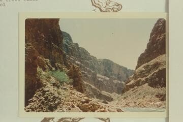Downriver at Olo Canyon. There is a cairn or granary at right of where creek falls into pool