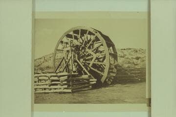 Water wheel below the railroad trestle at Green River