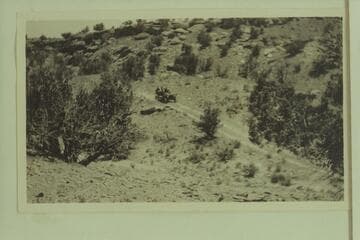 Chain Drive Stearns; first auto of Charles H. Spencer.  Bwtween Gallup and Fort Defiance.  Tires $550.00; $110.00 each.  Carried 9# of air.  C.H.S.  Spencer took this auto from Gallup to Oljato in 1909