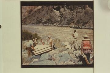 Wright-Stavely sadiron being portaged at mouth of Prospect Canyon at Vulcan Rapid
