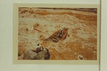 Pontoon No. 2 in Vulcan Rapid shortly after release from lines.  The lining enabled the craft to avoid the rough water in the open part of the rapid but this photo shows the dangerous position reached with the unwieldy craft