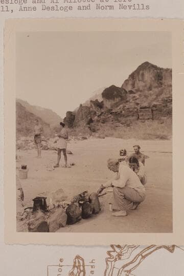 Breakfast prepared by Randall Henderson- mouth of Whitmore Wash.  Joe Desloge and Al Milotte at left, Randall, Anne Desloge and Norm Nevills