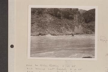 Rod Sanderson pilots the "Twin" through Mile 217 Rapid while Danny Daniels rides the bow.  Stage approximates 50,000 cfs