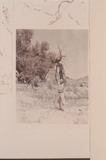 Maradel and Moulty Fulmer in a bit of horseplay. Camp at Three Fords Canyon, right bank. Mile 35 1/2