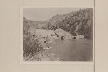 Ashley Falls.  A man is standing on a rock near the water in the center of the photo.  Extreme low water