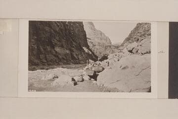 Mattowitteki Rapid.  Downstream view of Lava Escarpment Rapids showing the boats "Glen" and "Marble", the last to be lined past this rapid