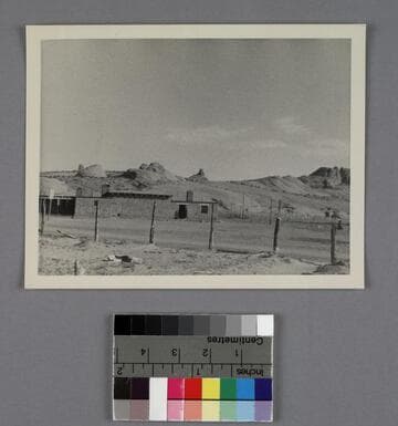 Adobe buildings and rock outcroppings in Kayenta, Arizona