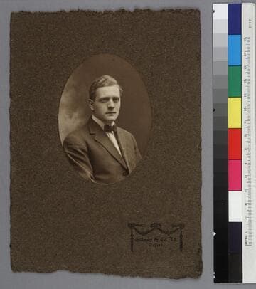 Studio portrait of Edwin Powell Hubble, in an oval frame