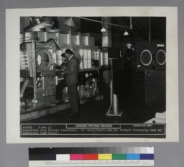 Edwin Powell Hubble and Lt. Mario Cantie watching a test in the supersonic wind tunnel at the U.S. Army Ballistic Laboratory, Aberdeen Proving Ground