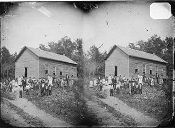Cherokee District school house and scholars, Tahlequah, 1879
