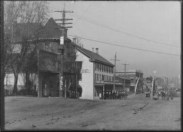 Street view of buildings, storefronts along road leading to old Truckee Bridge, Reno, Nevada