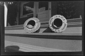 Baskets on steps of Nicholson's home and store at 46 N. Los Robles, Pasadena