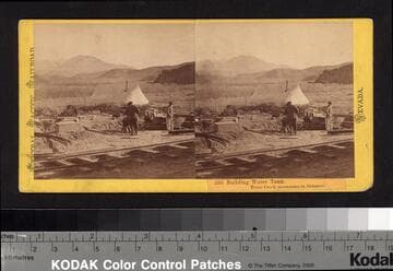 335.  Building Water Tank. Trout Creek mountains in distance