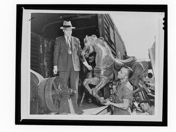 Robert Newcomb and merry-go-round horse