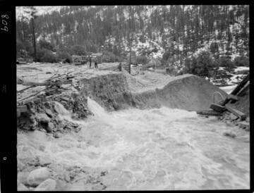 Big Creek - Mammoth Pool - Tunnel muck pile after storm, and Shakeflat breaking cofferdam