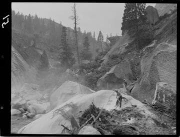 Big Creek - Mammoth Pool - Drilling large boulders on West abutment damsite