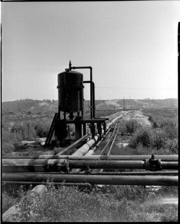 Tanks and pipes in oil field