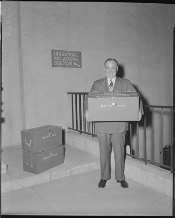 Man holding ballot box