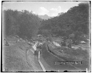 A construction crew at work cementing a ditch at Kaweah #2 Hydro Plant