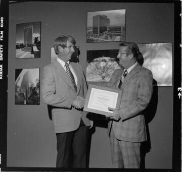 Conservation award presented to Tooley & Company