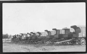 Long row of unhitched Imperial Ice Co